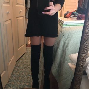 Black thigh high over the knee boots